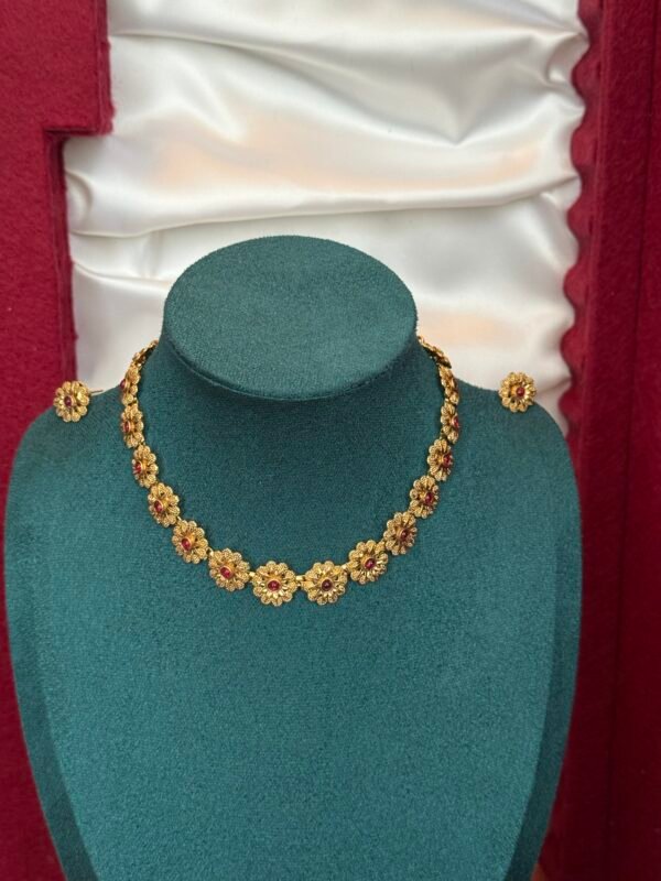 Golden floral ruby stone necklace with earrings