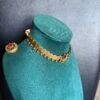 Red lotus coin necklace