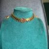 Red lotus coin necklace